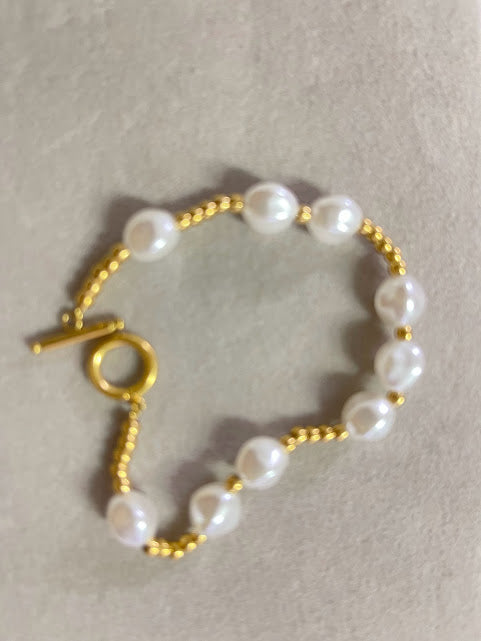 Pulseira Dourada com Pérola